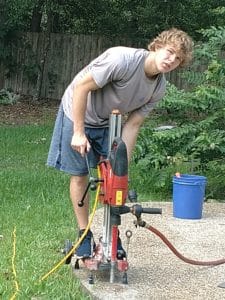 son installing pool fence